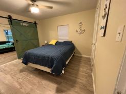 Arroyo City  cabin with private lighted fishing dock. BBQ pits and back deck.
