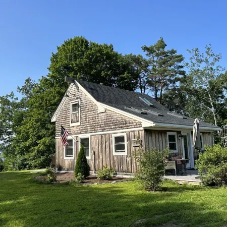 Waterfront cottage with deep water dock, ocean front.