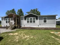 Beautiful Smith lake Home on a lazy sloping lot!!! No Stairs to the water!!!
