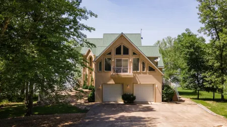 A Large Unique Panoramic Retreat at the Quiet 55-mile mark of Lake of the Ozarks