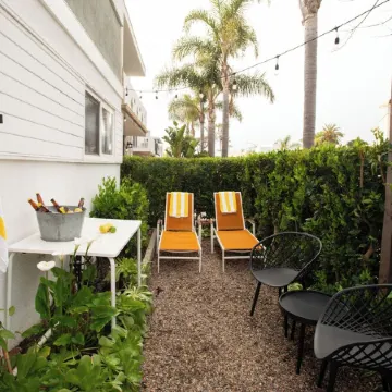 Gorgeous Casual and Comfortable Modern Home. Perfect Location Just Steps to Sand