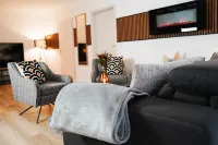 Fireplace, Parking Space & Balcony, Stylish Home Hotels in Paderborn