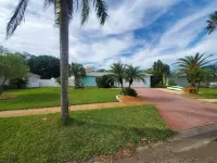 Island State of Mind! Amazing backyard on water with heated pool!