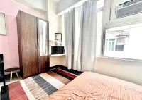 BGC Mckinley City Center Apartments Hôtels à : Taguig