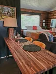 The Copper Squirrel is a secluded full log cabin on 10 acres.