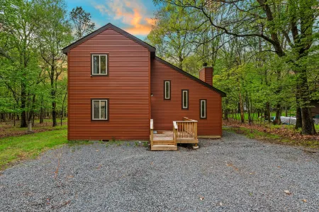 Lake Access and Expansive Deck - Charming Retreat with Cozy Fireplace