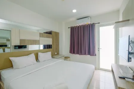 Homey and Comfy 2Br Sentul Tower Apartment