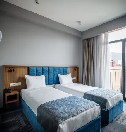 Address Inn Hotel Отели рядом с достопримечательностью «Башня с часами»