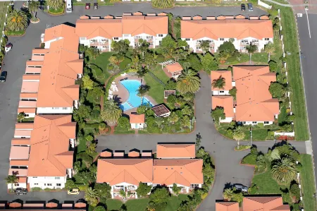 Pacific Palms Resort Отели в г. Папамоа