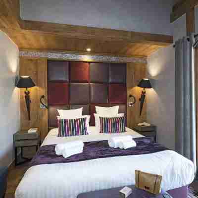 MGM Hôtels & Résidences – Hôtel Les Suites d’Alexane Rooms