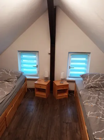 Guesthouse Rand Berlin-*Sonnenblume* for 3 adults or 2 adults + 2 children up to 12 years.