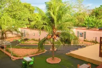 Abomey Event Hoteles cerca de Place GOHO