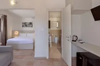Q Resort Hôtels à proximité de : Sala Del Regno Dei Testimoni Di Geova