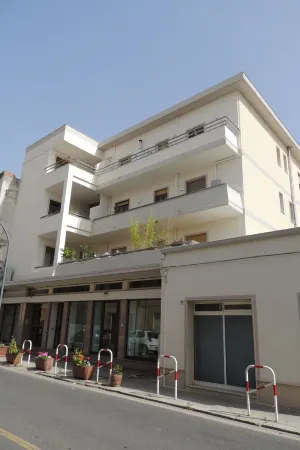 Top floor penthouse apartment with terrace in the historical center, 3 km from the beach Отели в г. Ористано