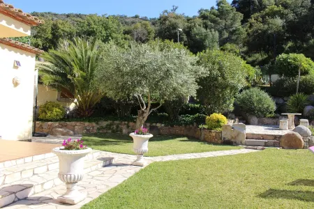Beautiful house surrounded by an idyllic garden with salt water pool.