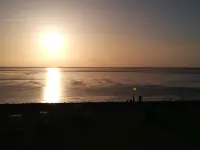 Apartment with private wooden terrace and beach chair