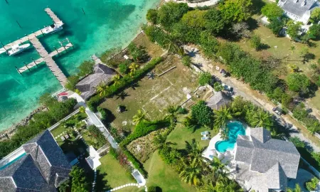 Stunning waterfront property with panoramic sunset views + pool + dock Отели в г. Данмор-Таун