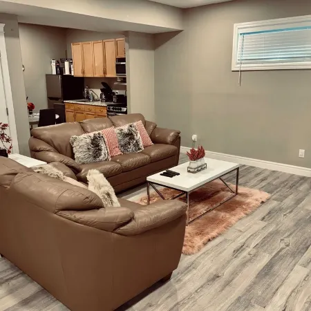 Cozy 2 bedroom basement with 2 beds, kitchen, 75’’ TV and bathroom