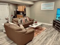 Cozy 2 bedroom basement with 2 beds, kitchen, 75’’ TV and bathroom