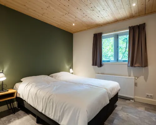 Boslodge โรงแรมในฮอนเดอร์ลู