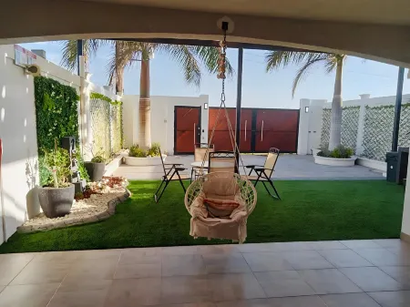 Puerto San Carlos Bay House & Tours -1st & 2nd Floor- Отели в г. Комонду