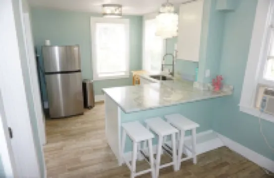 Tropical Oasis Steps to the Beach - Charming Hideaway with Fenced Yard