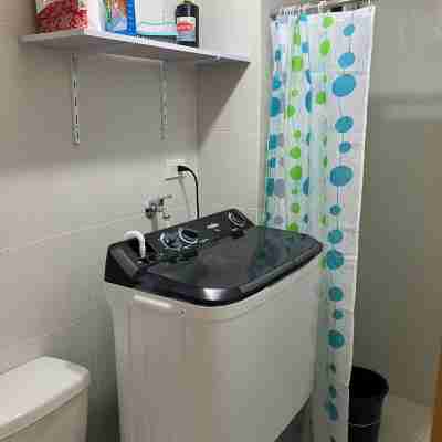 Cozy condo with AC and fitness room in lovely Dumaguete steps from the Ocean Rooms