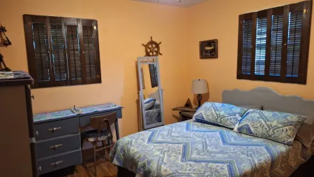 Cozy three bedroom, two bath house. 5 minute walk to the beach.