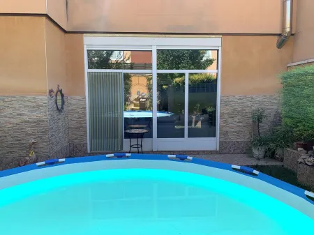 Suite Lujoso con Chimenea Patio y Garage Privado