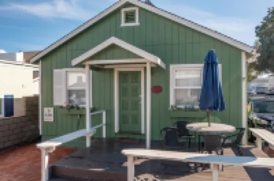 Across quiet street from sandy beach.