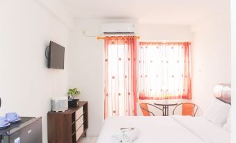 Chic and Cozy Studio at Riverview Jababeka Apartment