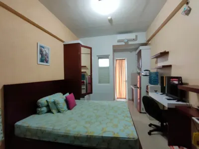 Nia Room at Student Castle Apartement