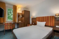Greet Hotel Darmstadt Hotels near RAILWAY STATION/HBF DARMSTADT RAILWAY STATION