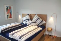 Modern flat facing south with view over mountains and lake - Wifi