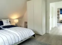 "Käptn 9a" thatched-roof villa with 105 sqm, sauna, fireplace, beach chair, double parking space