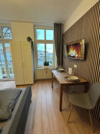 Studio with balcony in a central location Отели в г. Бад-Ротенфельде