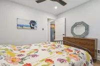 距海灘僅4棟房的小屋，含4張海灘通行證、沙灘椅、毛巾、遮陽傘