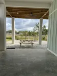 Beautiful home on the river, mins to the Gulf; fire-pit, bar, view