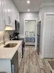 Newly Renovated Cozy 1 BR sleeps 4 and only 200 yards to the white sandy beach