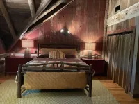 Prospect Mountain Cabin custom log home sportsman's paradise with fishing lake.