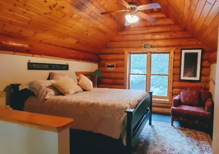 Spacious, family-sized, pet-friendly chalet style log home on Lake Chippewa.