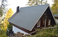 Adorable chalet perched in the forest with breathtaking views of the ski area.