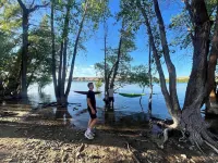 Hammocks & kayaks with1 bed trailer, tiki torches, & tent space for extra guest
