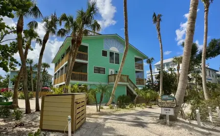 Private Beach Access Steps Away,  Pool, Outdoor Bar, 2 Golf Carts, 360 Views.