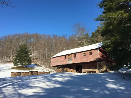 Farmhouse on 300 acres with 2 lakes near the heart of Amish Country