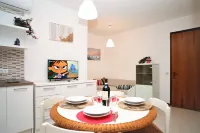 Downtown modern apartment for four people by Beahost Rentals Hotels in Lignano Pineta