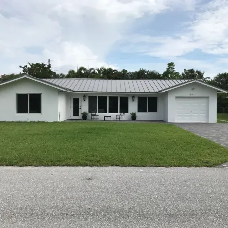 Newly Renovated 4/3 Upscale East Boca Home