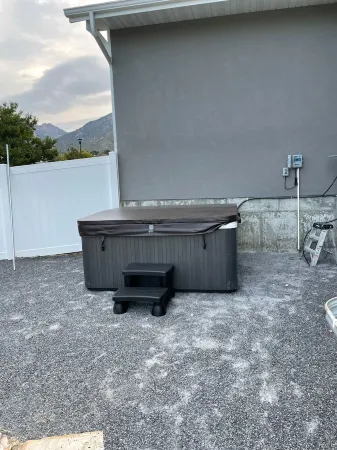 Brand New modern 3 story home with fenced in yard! Outdoor hot tub and firepit