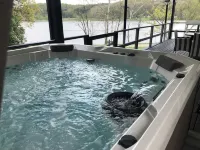 Charming 4-bed cottage with hot tub and stunning lake views in beautiful Logan.