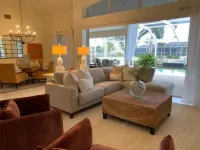Stunning SW home w/perfect indoor-outdoor living! Infinity pool/spa/great canal.